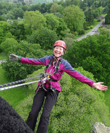 this is a picture of shirley sheridan abseiling down abberley tower.