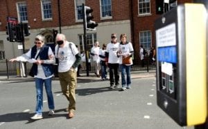 photo showing the Blindfold Mile with participants crossing the road pic by David Griffiths 22042017